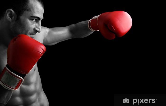 boxer with red gloves throwing a jab